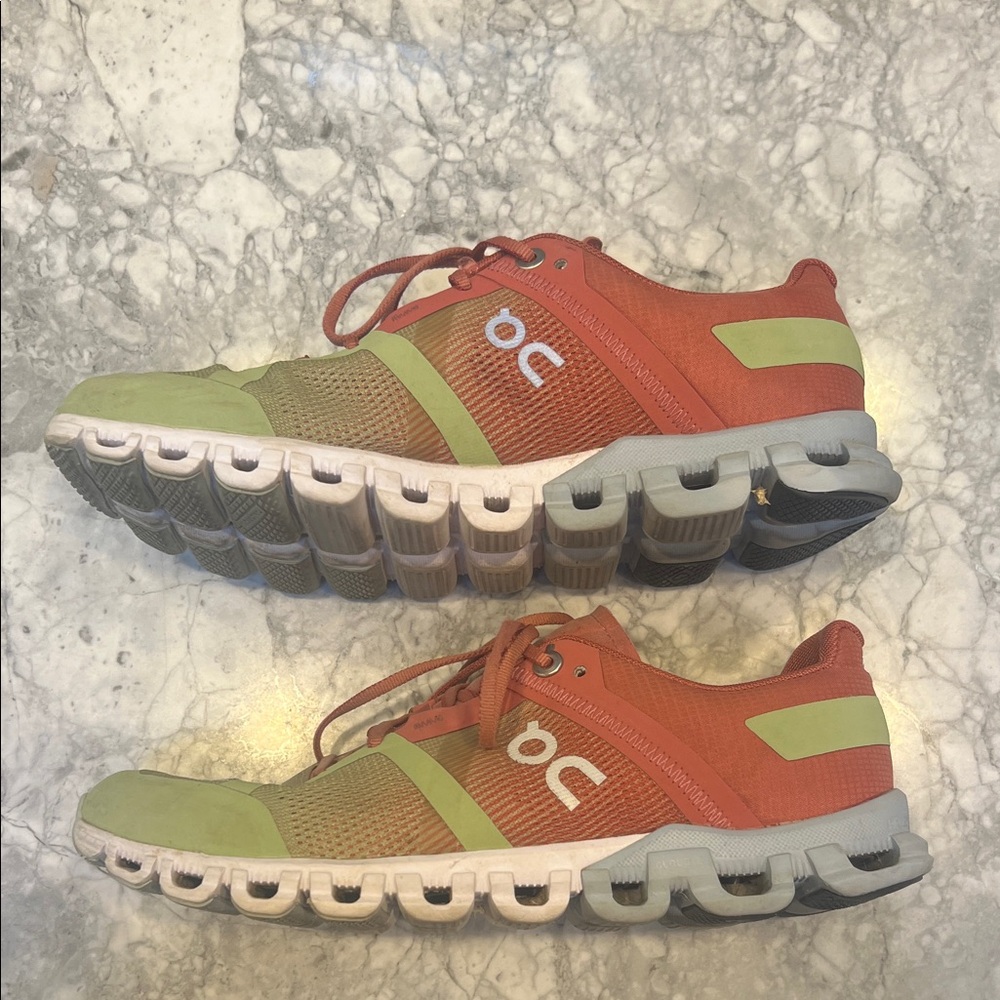 On Running Orange and Green Athletic Shoes